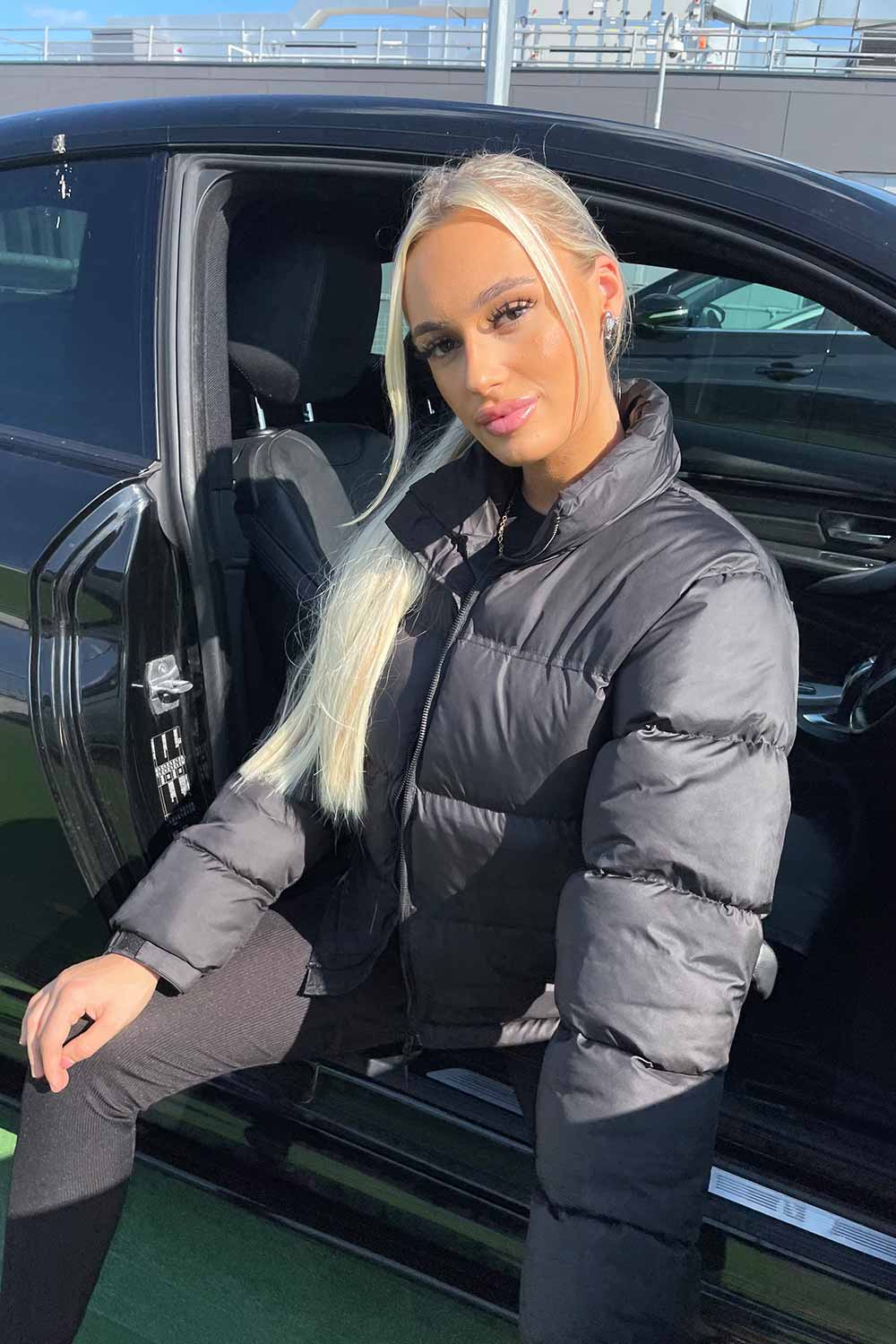 Women's Black Puffer Jacket - Weather-Resistant Zip Coat with Concealed Hood & Adjustable Hem